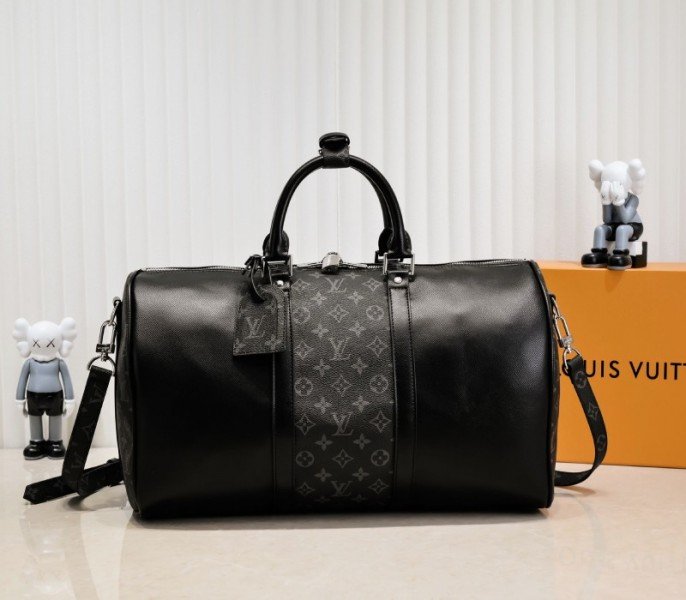 E4A443F6-00BD-4545-EF0A-13774833890A.jpg Louis Vuitton Taiga Leather Keepall Bandouliere 50 Travel Bag In Black - Image 1