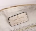 Louis Vuitton Bicolor Monogram Empreinte Leather Speedy Bandouliere 25 Handbag In Cream And Bois De Rose Pink - Image 6