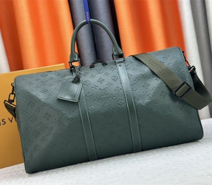 E7750536-A2D0-3245-7B3C-188235714137.jpg Louis Vuitton Taurillon Leather Keepall Bandouliere 50 In Borneo Green - Image 1