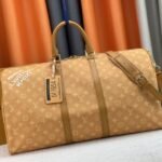 Louis Vuitton Monogram Heritage Canvas Keepall Bandouliere 55 In Yellow