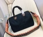 Louis Vuitton Econyl Regenerated Nylon Speedy Bandouliere 30 Handbag In Black - Image 2