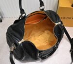 LV Monogram Empreinte Keepall Bandouliere 45 In Black - Image 4