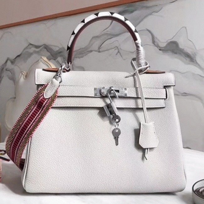 EF94FD9A-C60E-6C43-BED2-3CD71426636A.jpg White Hermes Kelly 28cm Knockoff Bag with Zigzag Handle - Image 1