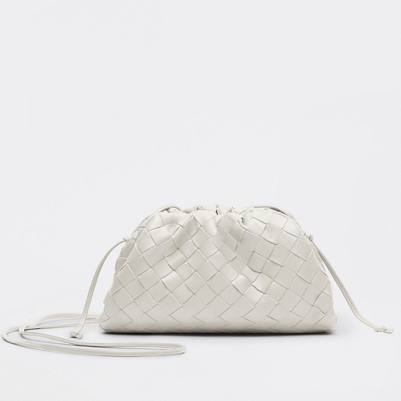 F2959758-FCB2-7EAF-8E16-820324EA2C04.jpg Replica Bottega Veneta Mini Pouch with Strap White - Image 1