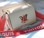 Louis Vuitton Epi Leather Twist MM Handbag In Quartz White With Gradient Strap - Image 4