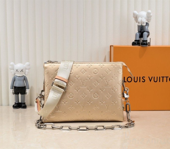 F3729AF8-0B1C-27C1-095C-2B9D7DA9ADEB.jpg Louis Vuitton Coussin PM Bag In Light Gold With Jacquard Strap - Image 1