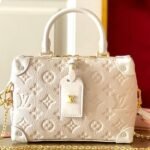 Louis Vuitton Monogram Empreinte Petite Malle Souple Handbag In Cream